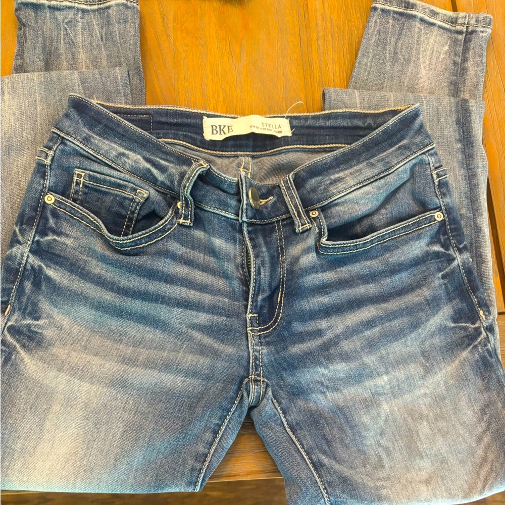 Midrise white wash jeans.